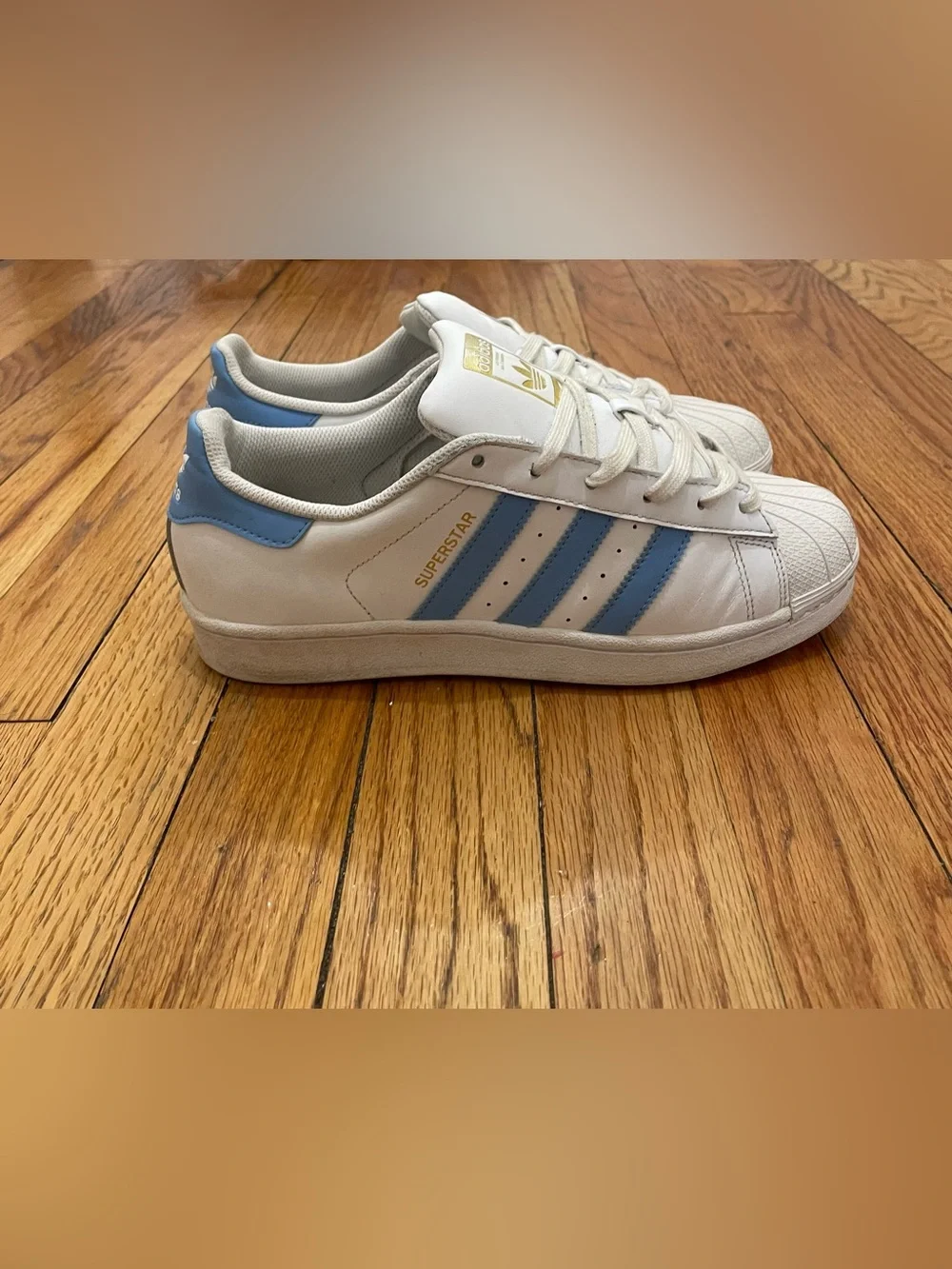 adidas Superstar Men’s Sneakers in White with Light Blue Stripes